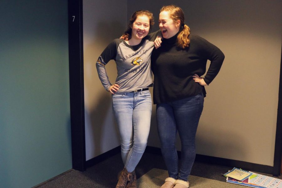Kate Lawlor, a sophomore in the College of Arts & Sciences, and Natalie Schmaus, a freshman in the College of Nursing, pose wearing jeans in support of Denim Day.