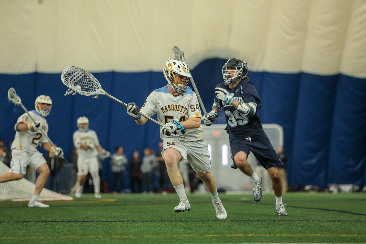 Senior goalie Cole Blazer made 14 saves in a 7-4 loss to Denver last Saturday. Marquette will look to win the BIG EAST Tournament for the third straight season (Photo courtesy: Marquette Athletics).