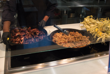 Wild Commons barbecue station often includes ribs, brisket and pork. 