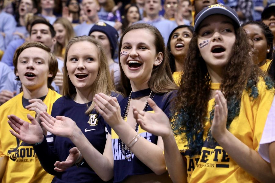Students+cheer+in+the+stands+of+the+Bradley+Center+at+the+Mens+Basketball+game+on+National+Marquette+Day+2018.+
