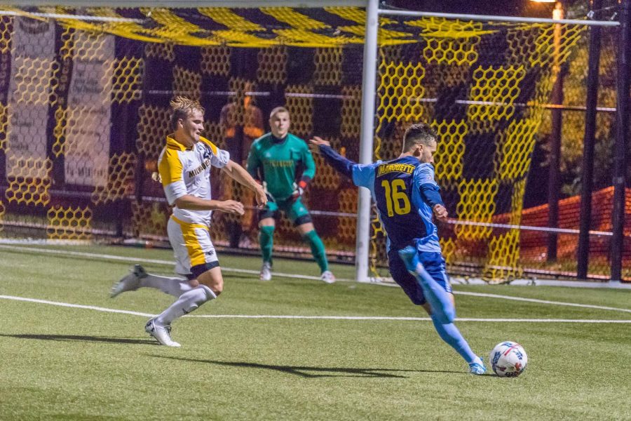 Marquettes Josh Coan (16) attempts a goal in the Golden Eagles loss to UWM at Engelmann Stadium.