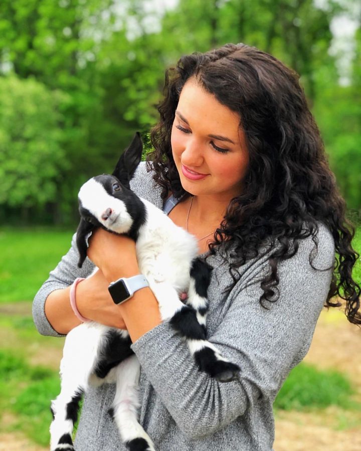 Gwyn Jones with one of her familys 200 goats. 
