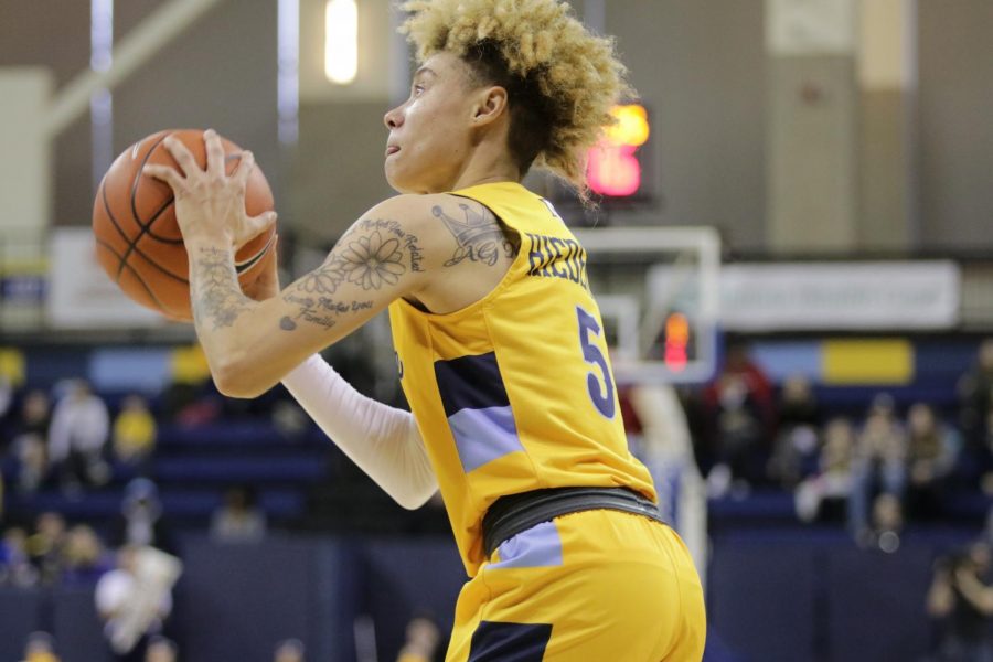 Natisha Hiedeman, a senior at the time, attempts a shot against Providence at the Al McGuire Center.