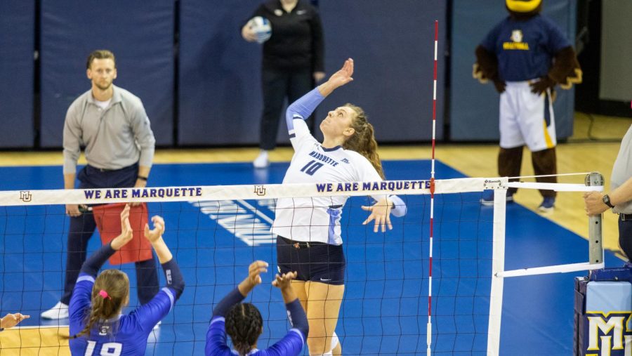Allie Barber (10) attempts a kill in Marquettes 3-2 loss to Creighton. She led the Golden Eagles with 18 kills Friday night at Villanova.