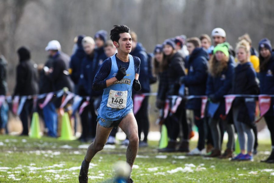 Junior cross country runner Paolo Tiongson runs in the BIG EAST Tournament. 