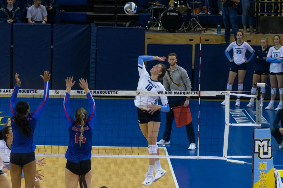Allie Barber (10) attempts a kill in Marquettes sweep over DePaul Nov. 9 at the Al McGuire Center.