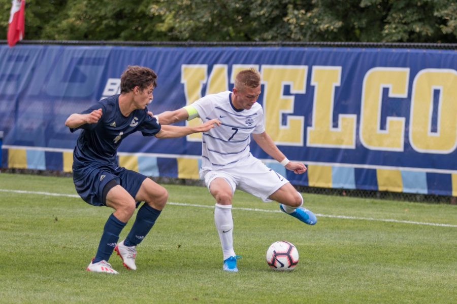 Patrick Seagrist looks to get past a UC-Davis defender.