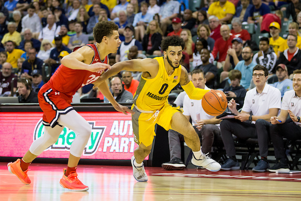 Markus Howard dribbles the ball in Marquettes  73-63 win over Davidson in Orlando. (Photo courtesy of Marquette Athletics.)