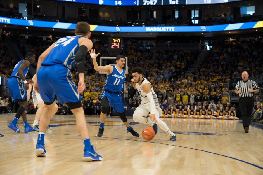 Markus Howard (0) guarded closely by Creightons Marcus Zegarowski (11) in the Bluejays 66-60 upset of the then-No. 10 Golden Eagles March 3 at Fiserv Forum.