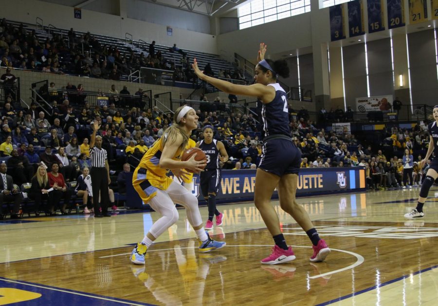 Senior Isabelle Spingola (30) lead the Golden Eagles with a season-high 20 points in Marquettes 20-point win over Xavier Sunday afternoon. (Marquette Wire stock photo.)