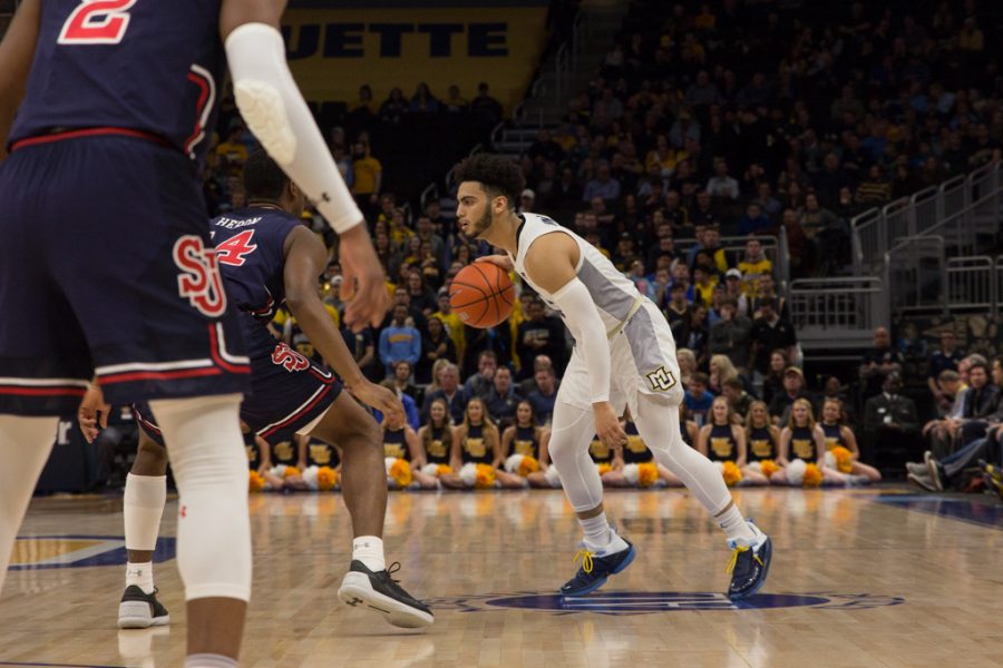 Markus Howard (0) dribbles the ball in Marquettes 70-69 loss to St. Johns at Fiserv Forum Feb. 5, 2019. (Marquette Wire stock photo.)