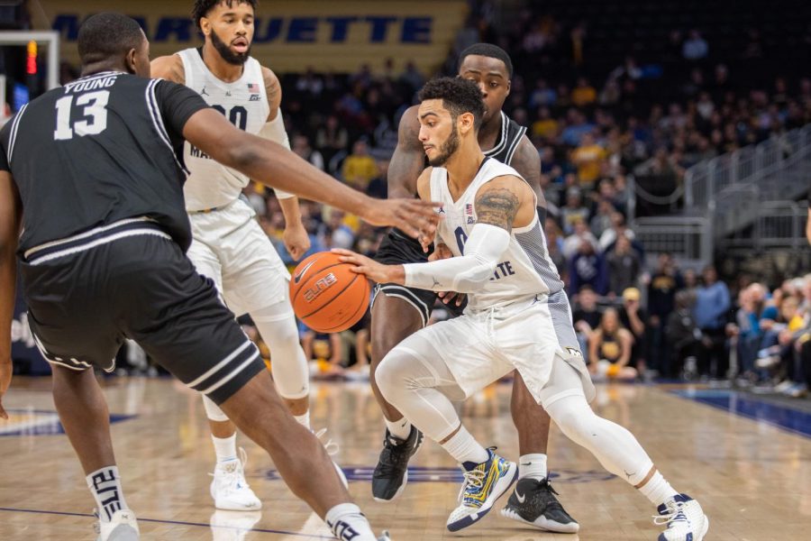 Markus Howard (0) dribbles the ball in Marquettes 81-80 overtime loss to Providence. The senior guard scored 39 points.