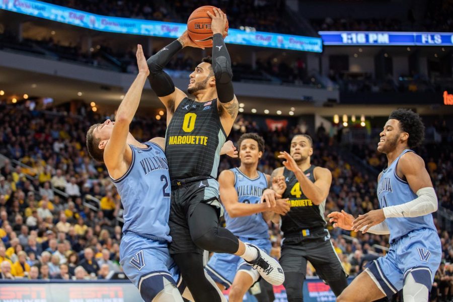 Markus Howard (0) recorded a game-high 29 points and season-high eight rebounds Saturday afternoon in Marquettes victory over No. 10 Villanova.