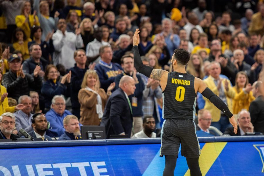 Markus Howard (0) pumps up the crowd at Fiserv Forum Jan. 4. The Golden Eagles went on to upset the then-No. 10 Villanova Wildcats 71-60.