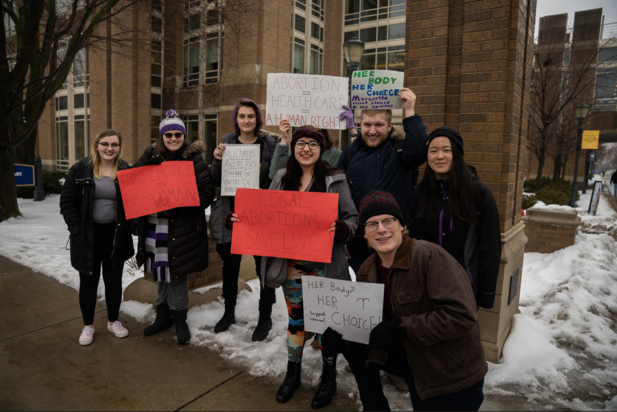 Students+held+up+signs+supporting+abortion.