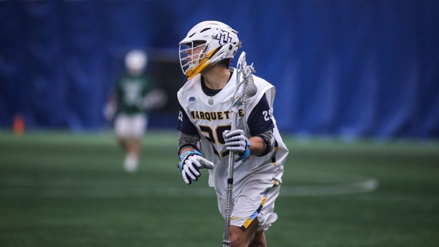 Devon Cowan looks down the field on the attack in Marquettes 11-9 loss to Jacksonville on Feb.15. (Photo courtesy of Marquette Athletics)
