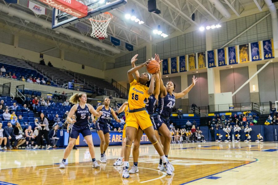 Camryn Taylor (15) goes up for the layup in Marquettes 61-48 win over Xavier. 