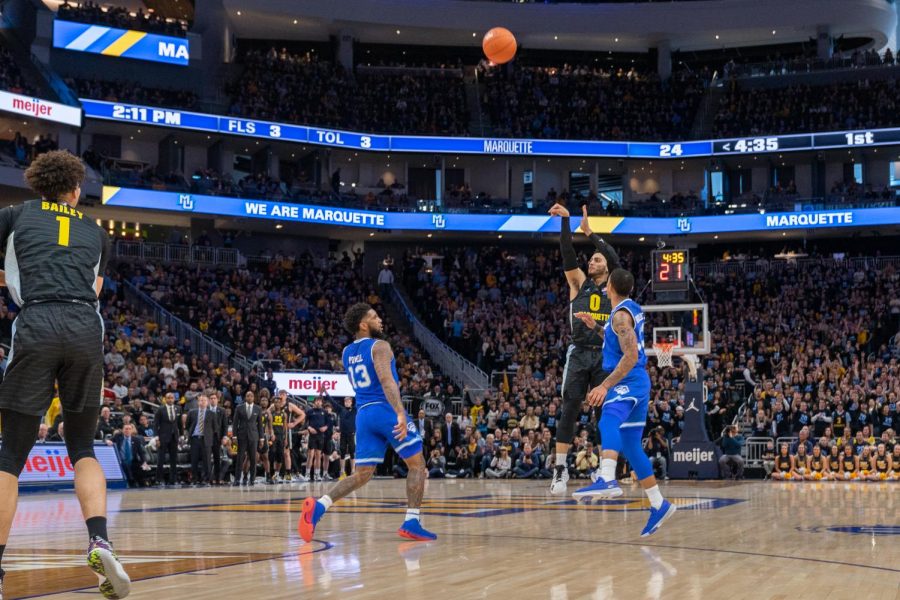 Markus Howard (0) attempts a 3-pointer in Marquettes 88-79 loss against No. 13 Seton Hall Feb. 29 at Fiserv Forum. 