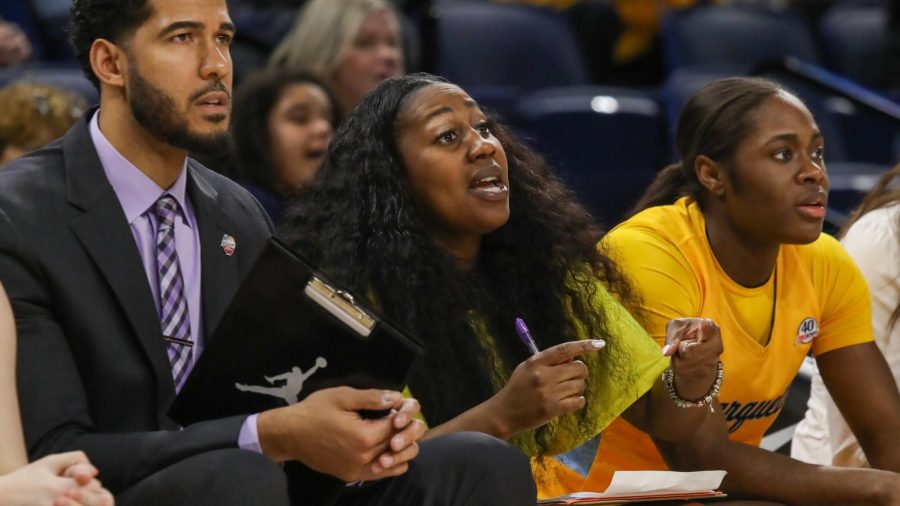 Vernette+Skeete+%28center%29+coaches+from+the+sidelines+next+to+Scott+Merritt+%28left%29+at+the+2020+BIG+EAST+Womens+Basketball+Tournament+in+Wintrust+Arena.+%28Photo+courtesy+of+Marquette+Athletics.%29