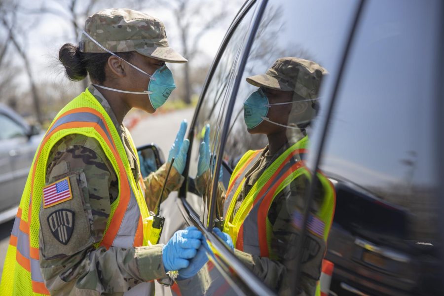 New York National Guard member conducts vehicle COVID-19 testing. Photo via Flickr. 
