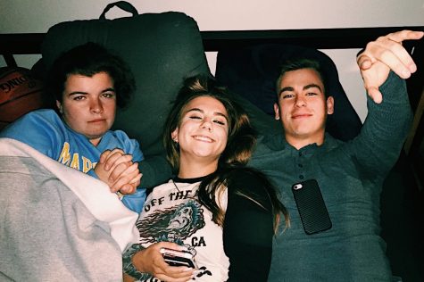 From L to R: Izzy Melia, Reese Seberg and Nick Cinquepalmi enjoy residence hall life by watching movies and relaxing in October 2019. Photo courtesy of Reese Seberg.