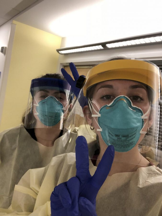 While working through a global pandemic, Yvonne Danko (right) and a friend pose in their PPE gear. Photo courtesy of Yvonne Danko