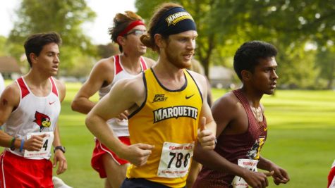 Daniel Pederson runs during cross country season. (Photo courtesy of Marquette Athletics.)