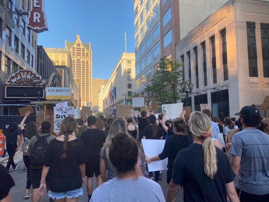 The Marquette protest group reaches downtown to join the larger protest. 