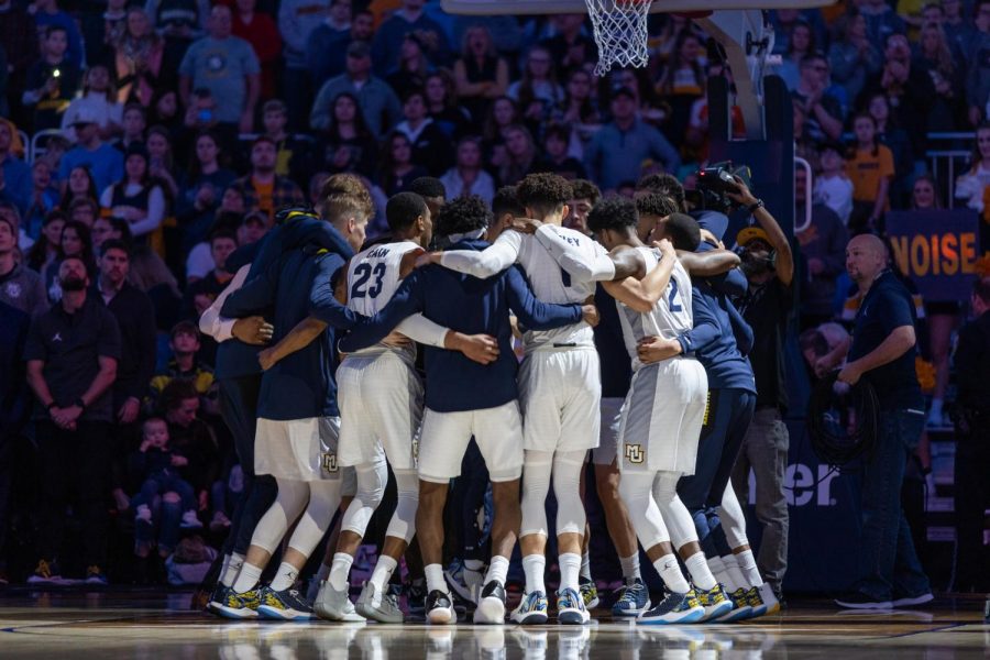 The Marquette men's basketball team gets ready before a game against Central Arkansas on December 28, 2019. 