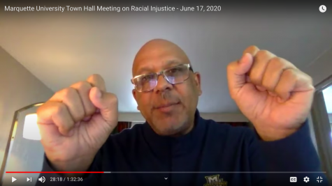 Provost Kimo Ah Yun demonstrates what his father taught him he should do if pulled over by a police officer in the virtual town hall on racial injustice.