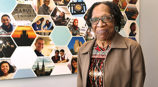 Jacqueline Walker receives Excellence in Diversity and Inclusion Award. Photo courtesy of Marquette Today.