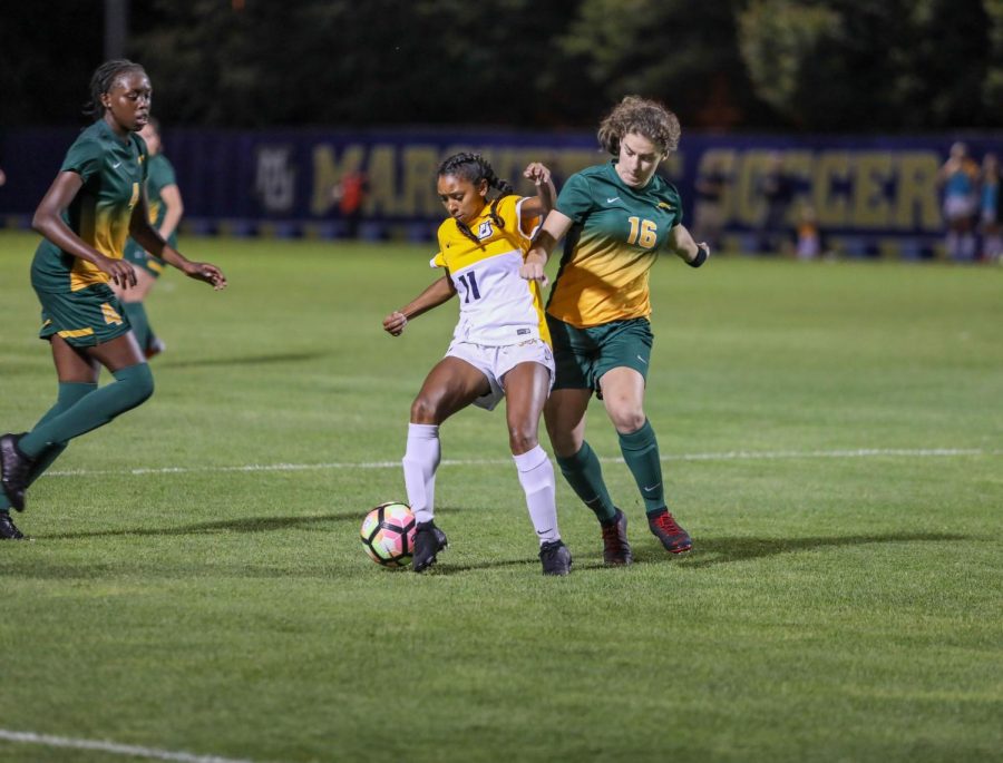 Shelby Fountain dribbles the ball in Marquettes 5-0 exhibition win against University of Regina Aug. 2019. (Photo courtesy of Marquette Athletics.)