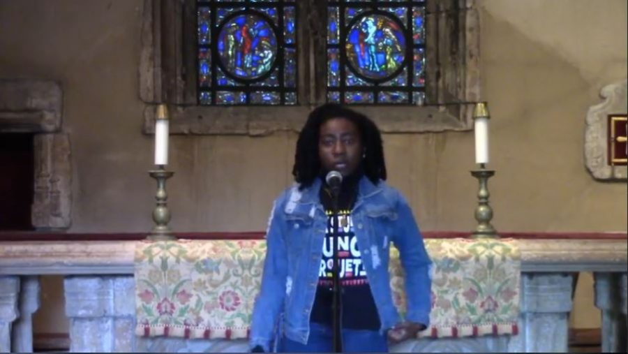 Breanna Flowers, President of Black Student Council, speaks at the prayer service.