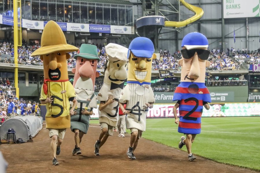 The Johnsonville sausages race during the sixth inning during the third game of the final home series between the Milwaukee Brewers and the Chicago Cubs on September 5, 2018, at Miller Park in Milwaukee, WI.