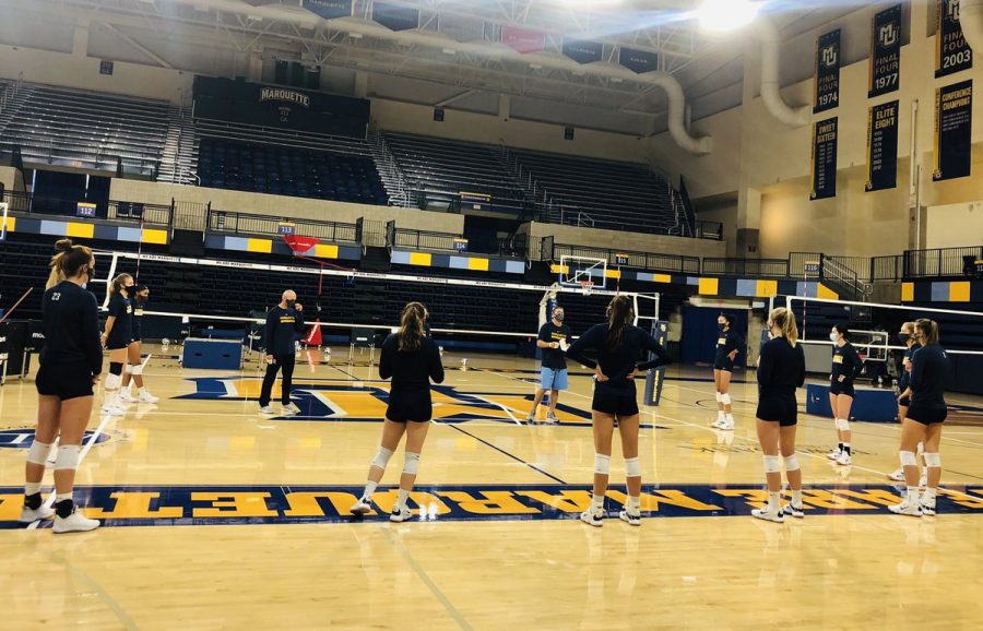 The volleyball team huddles during practice Oct. 15. (Photo courtesy of Marquette Athletics.)