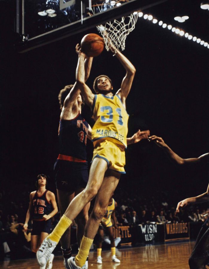 Bo Ellis jumps for a rebound during a game against DePaul circa 1976-77. Photo courtesy the Department of Special Collections and University Archives, Raynor Memorial Libraries, Marquette University.