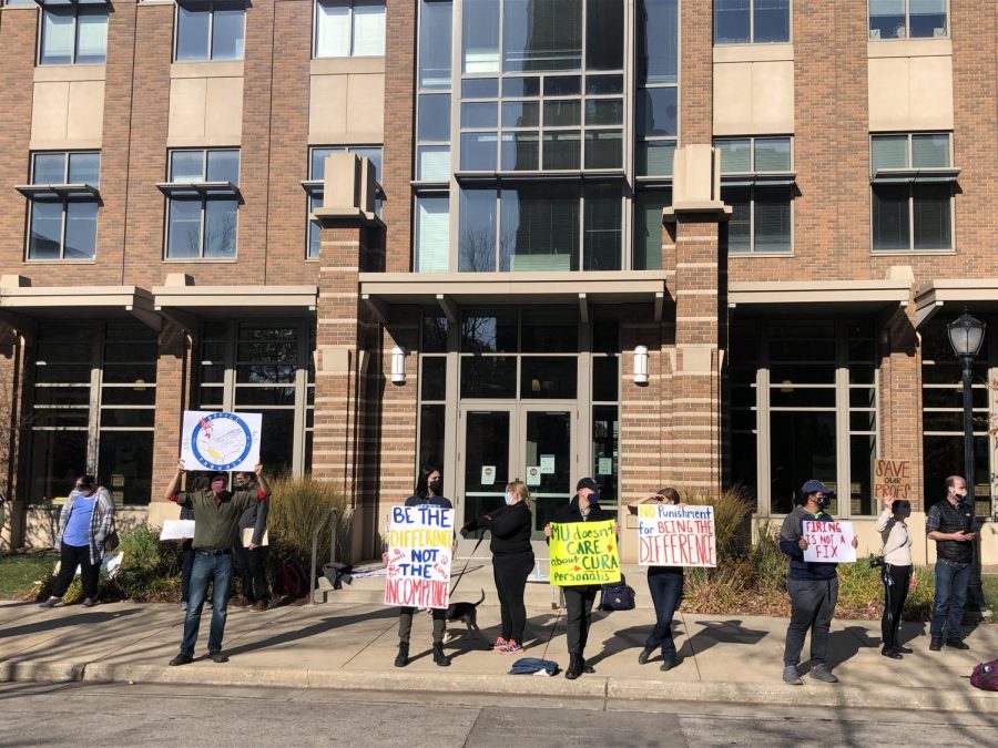 Protesters stand outside of Zilber while McArdles hearing happens at the same time.