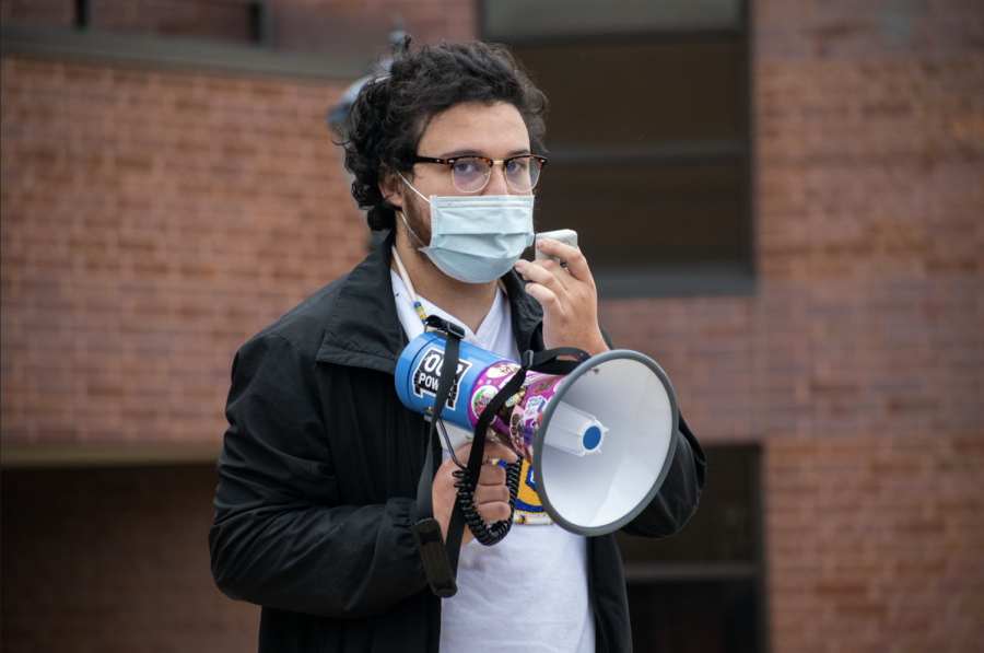 Senior Alex Liberato held a protest to change the university seal Oct. 12.
