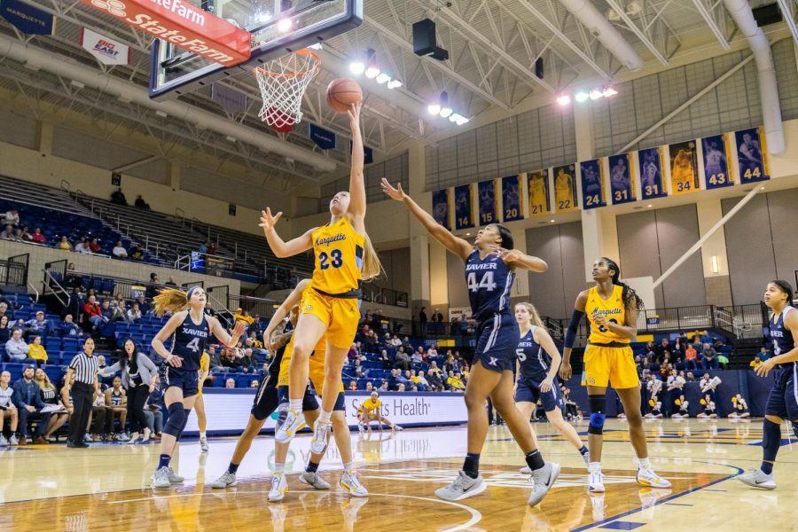 Jordan King (23) attempts a layup in Marquette's 61-48 win to Xavier Feb. 14, 2020.