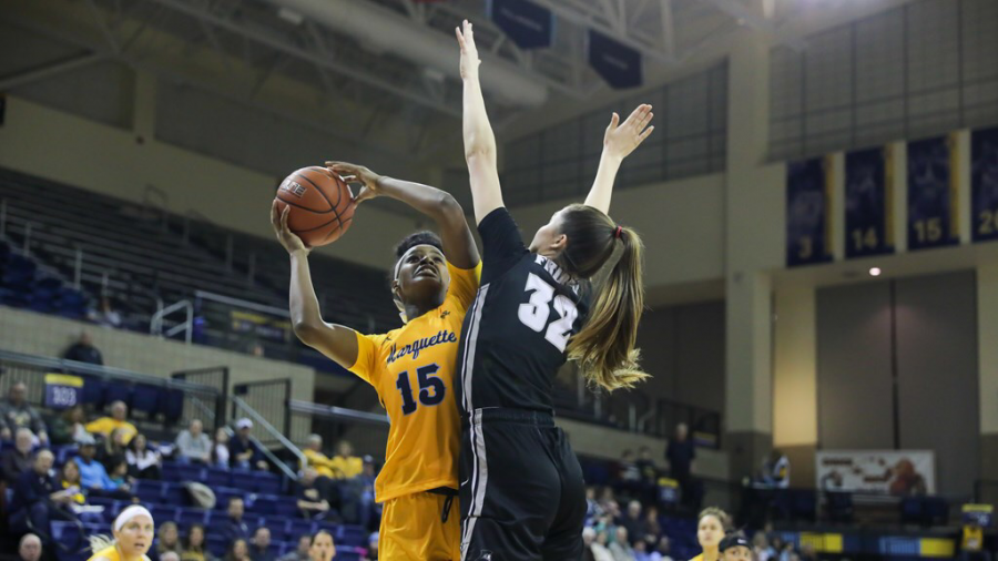 Camryn Taylor (15) goes up for a layup in Marquettes 85-55 win over Providence on Jan. 31 2020. (Photo Courtesy of Marquette Athletics.)