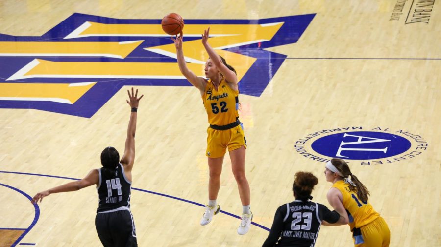 Chloe+Marotta+shoots+a+jumper+in+Marquettes+victory+over+Georgetown+Jan.+20.+%28Photo+courtesy+of+Marquette+Athletics.%29