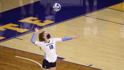 Senior Taylor Wolf serves the ball against ISU (Photo courtesy of Marquette Athletics.)