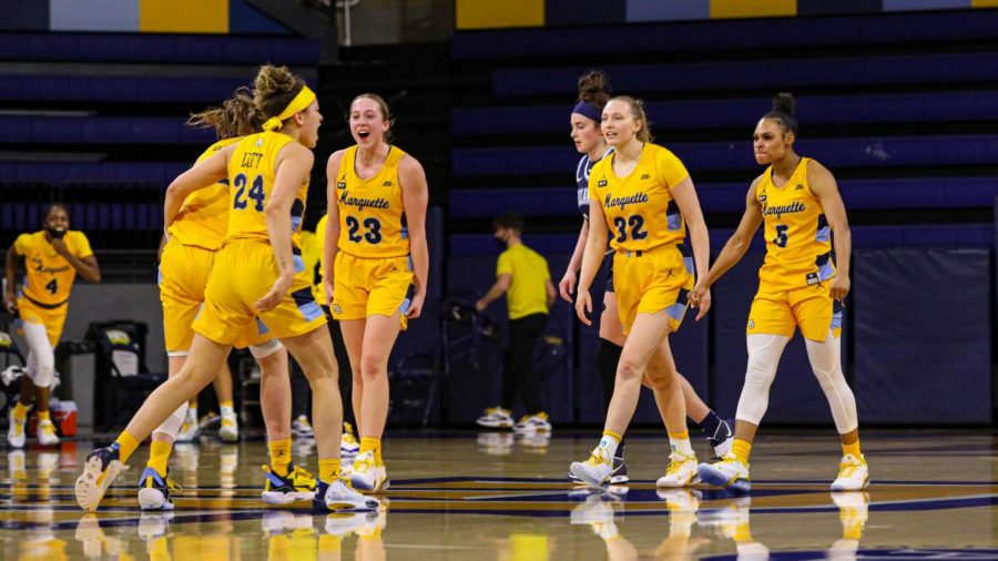 Marquette womens basketball celebrates during their 65-57 win over Villanova on Feb. 19 2021. (Photo courtesy of Marquette Athletics.)