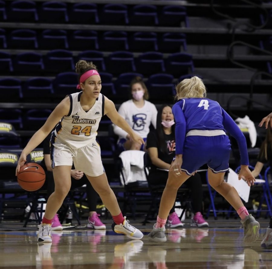 Selena Lott (24) takes on a Creighton defender in Marquettes 65-41 win over Creighton on Feb. 22 2020. (Photo courtesy of Marquette Athletics.)