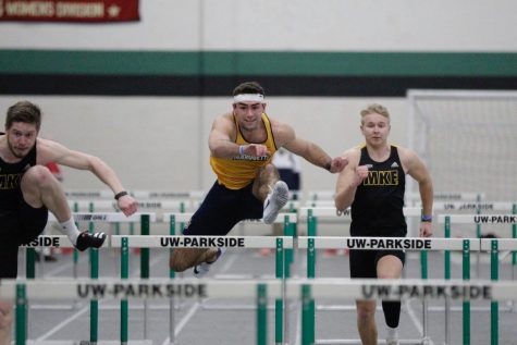 Sophomore Mitchell Van Vooren hurdles a gate during the Parkside Triangular meet on Feb. 6 (Photo courtesy of Marquette Athletics.)
