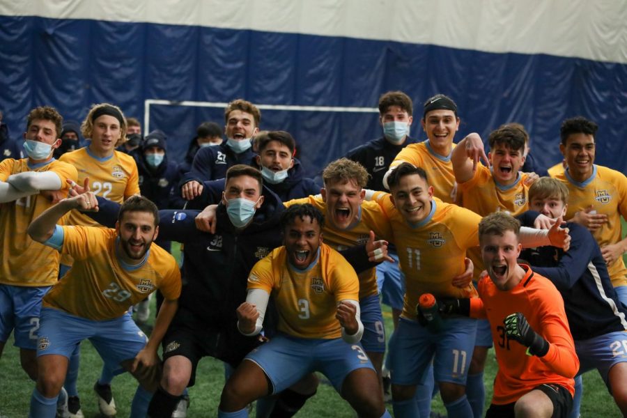The Marquette mens soccer team celebrates after their overtime win against Loyola Chicago on Wednesday night (Photo courtesy of Marquette Athletics.)
