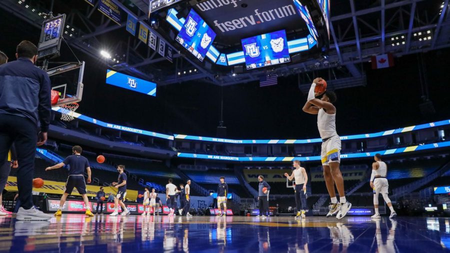 The+Marquette+mens+basketball+team+warms+up+before+their+game+against+Butler+on+Feb.+2+%28Photo+courtesy+of+Marquette+Athletics.%29