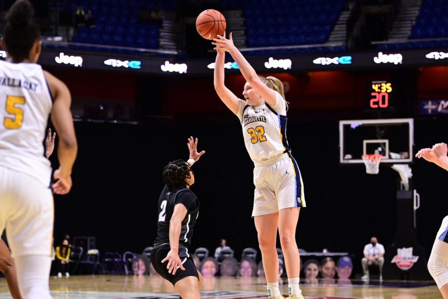 First-year forward Liza Karlen shoots a jumper in Marquettes win over Providence on Saturday evening (Photo courtesy of Marquette Athletics.)