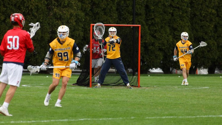 Redshirt first-year goalie Sean Richard (72) directs his teammates during the teams game against St. Johns April 14 (Photo courtesy of Marquette Athletics.)