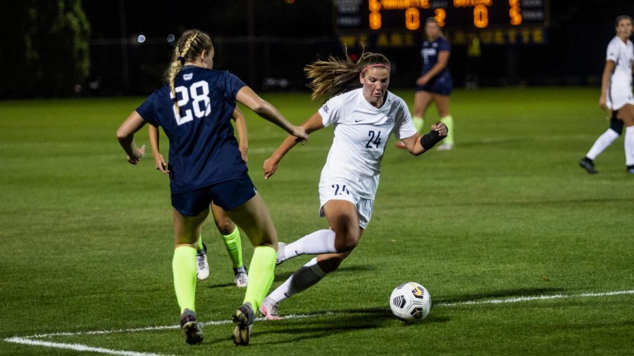 Katrina Wetherell (24) makes a move on a Butler defender while heading to net in the Golden Eagles 1-0 loss to the Bulldogs Sept. 23. (Photo courtesy of Marquette Athletics.)  